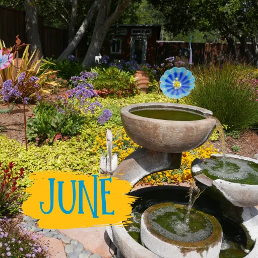 Warm season garden with fountain and a "June" title