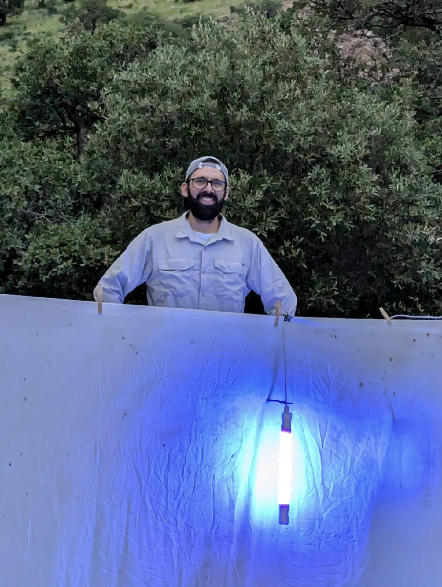 Entomologist Joel Hernandez and his blacklighting setup.