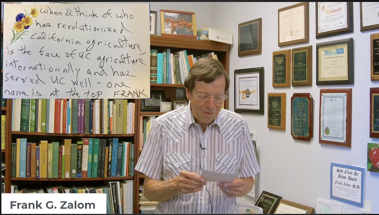UC Davis Distinguished Professor Emeritus (on recall) Frank Zalom reads a note from Bruce Hammock