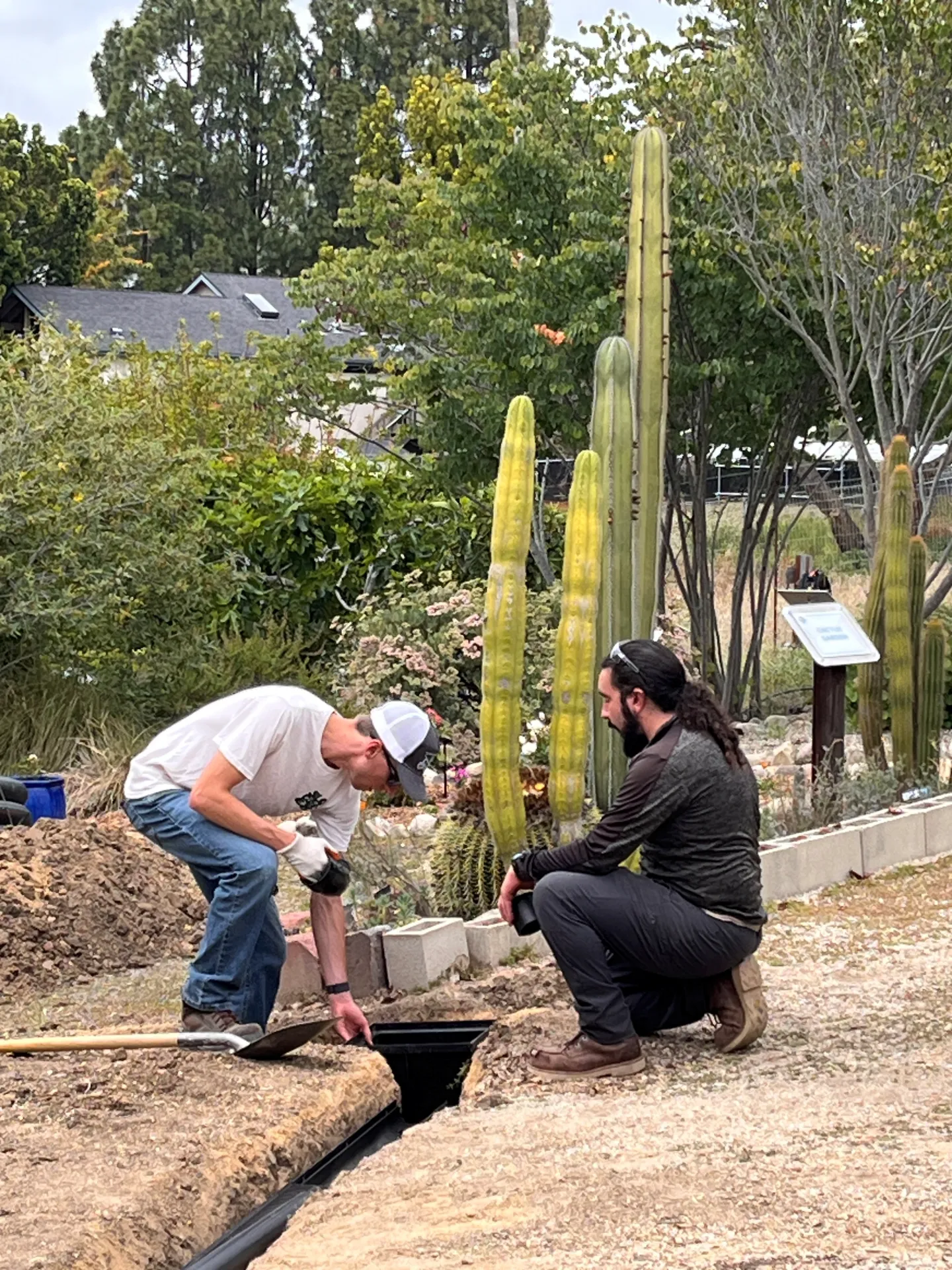 Cal Poly’s student chapter of the American Society of Civil Engineers (ASCE) work on drain