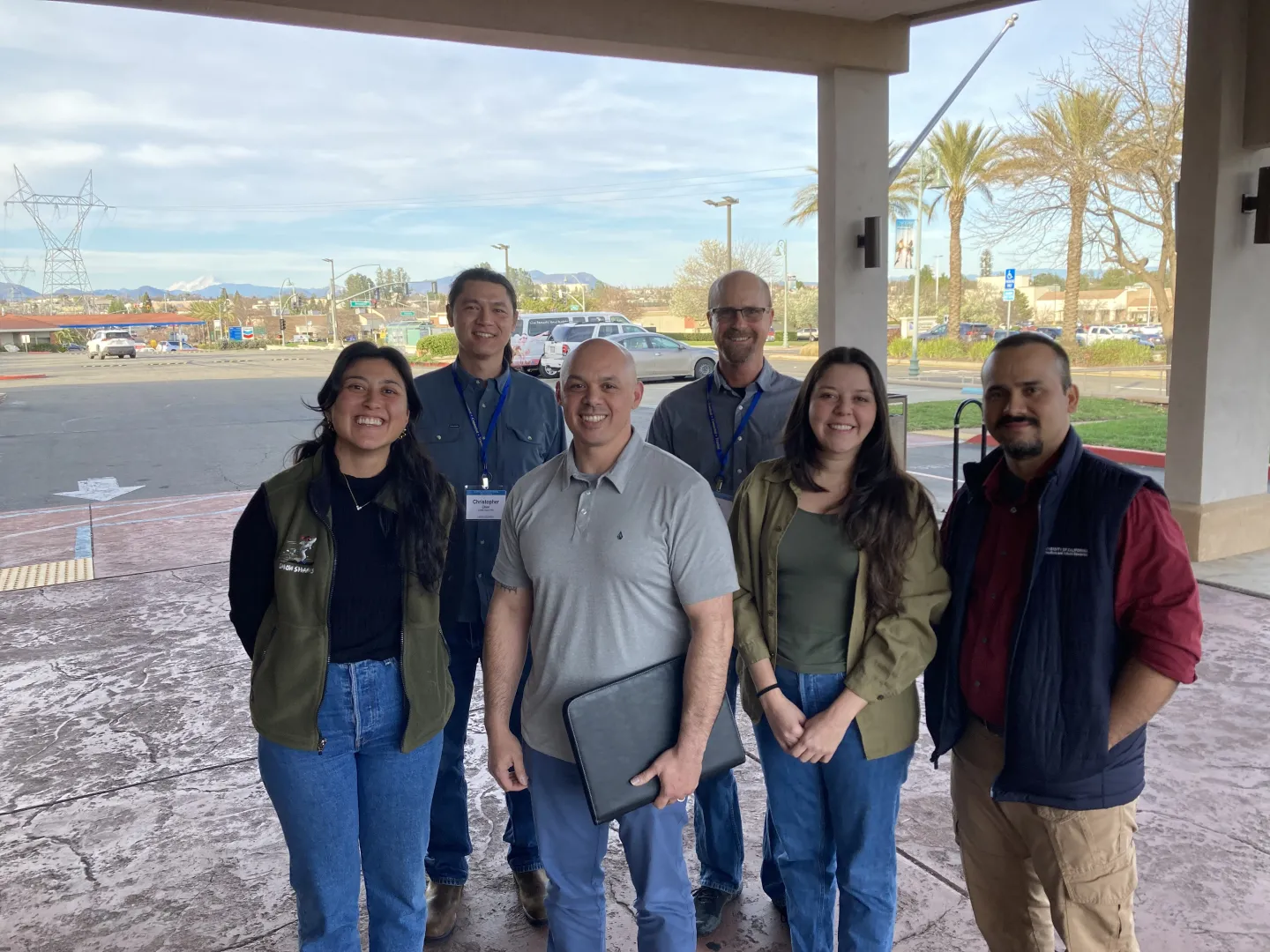 UC ANR colleagues smile for a group photo during a regional academics meeting