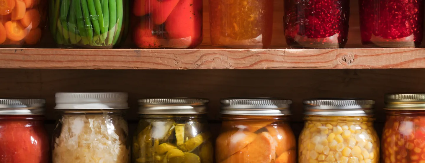 Jars of colorful preserved foods.
