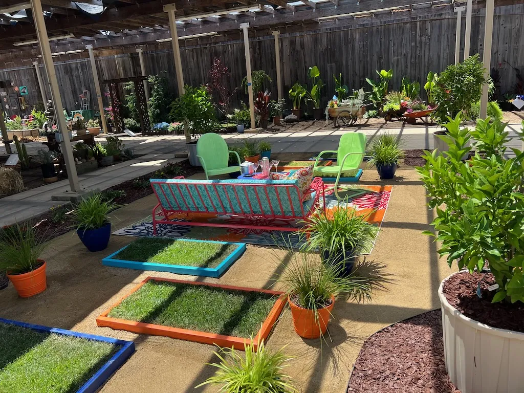 photo of 2025 demo garden- 1950's inspired patio, orange, turquoise, blue and green colors