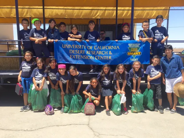 desert gardens with sign