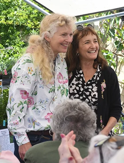 Pollinator enthusiasts Kate Frey and Annie Hayes, owner of Annie's Annuals and Perennials, receive applause at the bee gardening presentation. (Photo by Kathy Keatley Garvey)