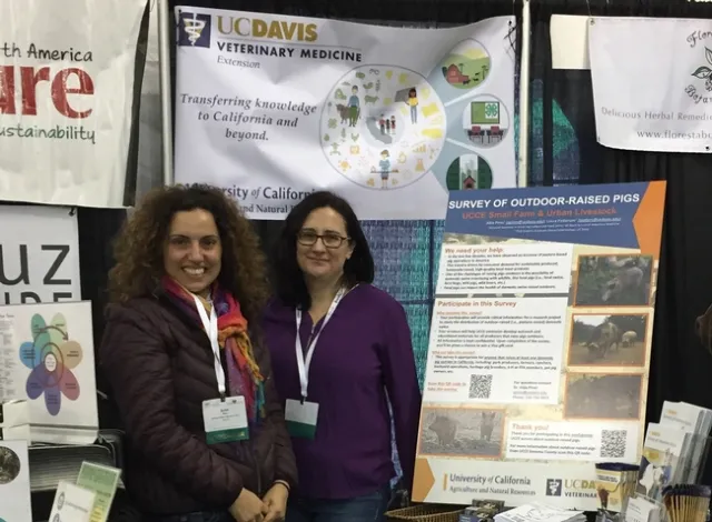 Alda Pires and Laura Patterson talked to people about raising pigs and chickens.