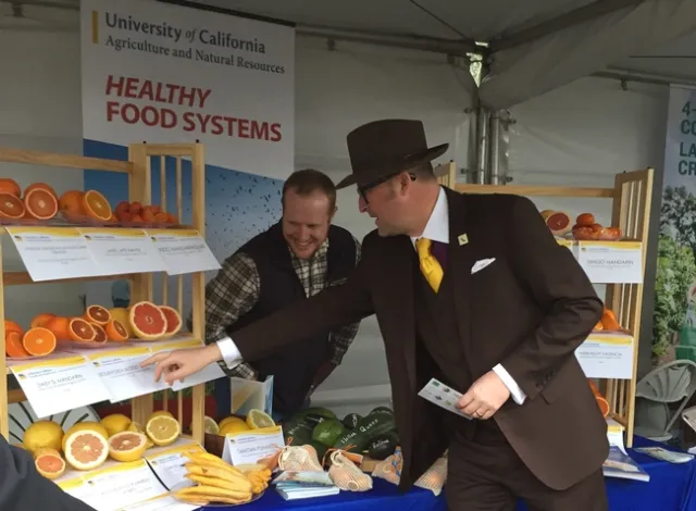 Assemblymember Matthew Harper checks out the citrus varieties.