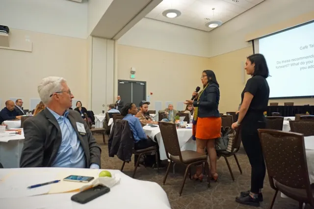 Director of the California Department of Pesticide Regulation, Brian Leahy, listens to a IPM Summit participant share ideas.