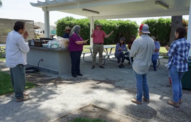 Andreas Westphal, center, thanks the staff and academics at the UC Kearney Agricultural Research and Extension Center.