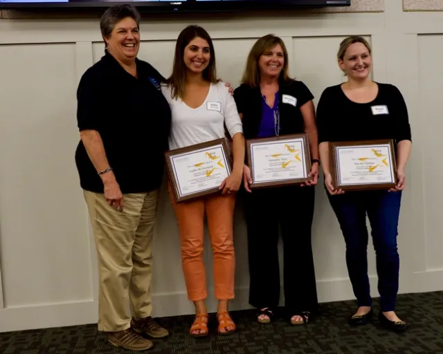 Humiston with PSU's Kellie McFarland, Saundra Wais and Rachel Palmer.