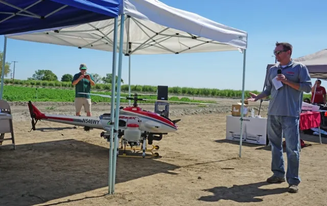 Brad Anderson of Yamaha Motor Corporation said the company's mini helicopter, which can carry a 4.2 gallon payload, is used widely for spraying crops in Japan.