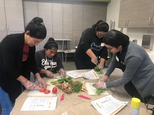 Parents putting their knife skills to the test.