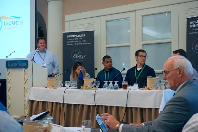 UC ANR chief innovation officer Gabe Youtsey, left, moderates a panel at AgTechx.