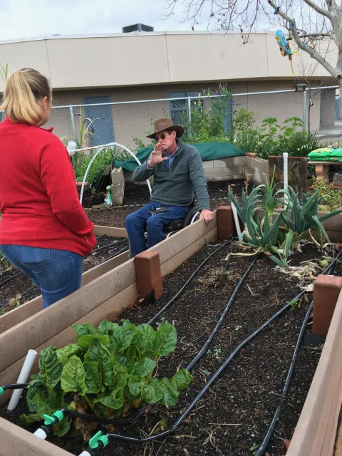 MG consulting at a school garden