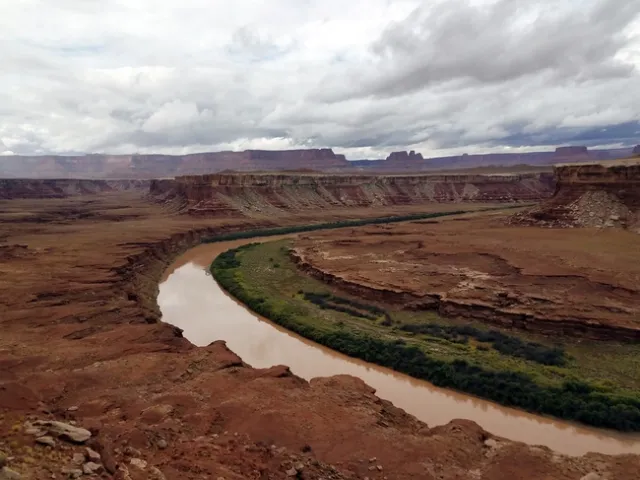 View of the green river from Turks head in 2016, notice all of the riparian vegetation is green.