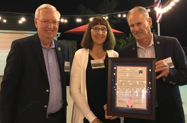 Andy Vasquez, Jr., chair of the Yuba County Board of Supervisors, and Supervisor Randy Fletcher, presented Hasey with a proclamation.
