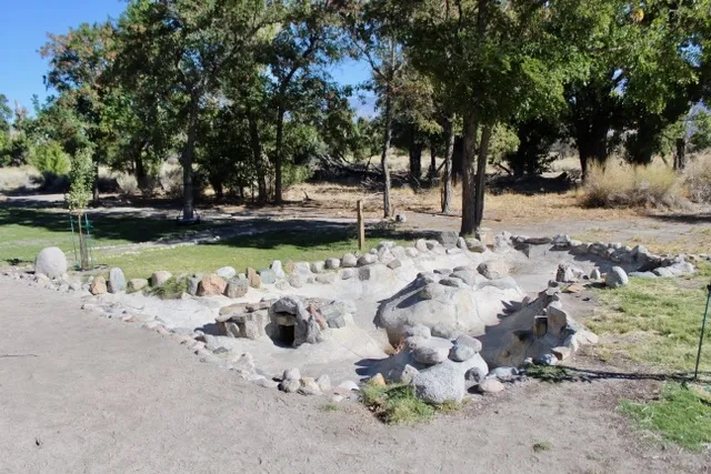 A reconstructed barracks garden with pond