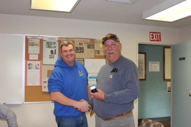 Martin Beaton accepts his 40 year service pin.