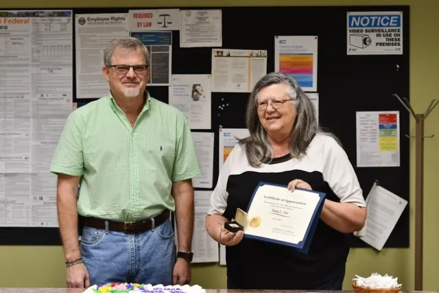 Director Jeff Dahlberg thanks Diana Nix at her celebration.