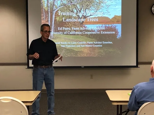 Ed Perry discusses proper training and pruning of trees. (A. Schellman)