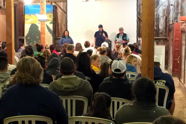 Dr. Mike's team speaks to the huge crowd