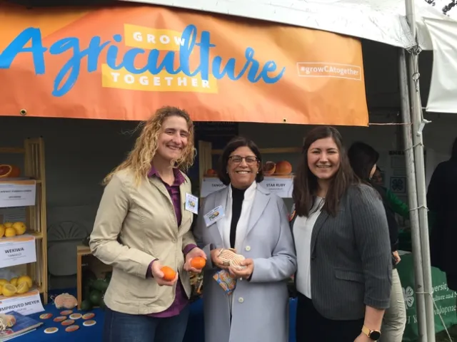 At Ag Day at the Capitol, UCCE Modoc County Director Laura Snell talks with Assemblymember Cecilia Aguiar-Curry and Maci Mueller.