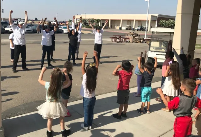 Student teachers lead the physical activity during Week 5