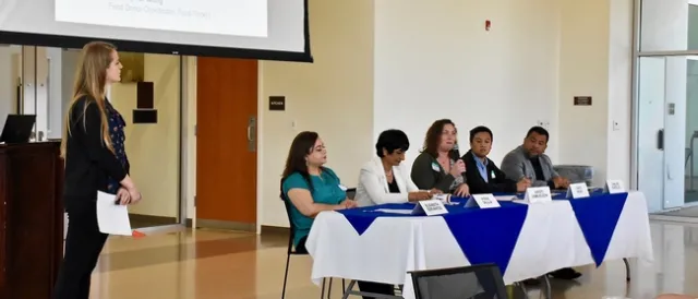 UCCE Advisor Natalie Price facilitating the panel discussion