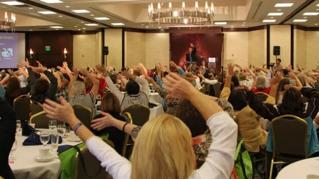 Carl Winter, shown performing at a conference, is an internationally respected food-safety expert known for using humor and music to communicate important messages about food and agriculture.