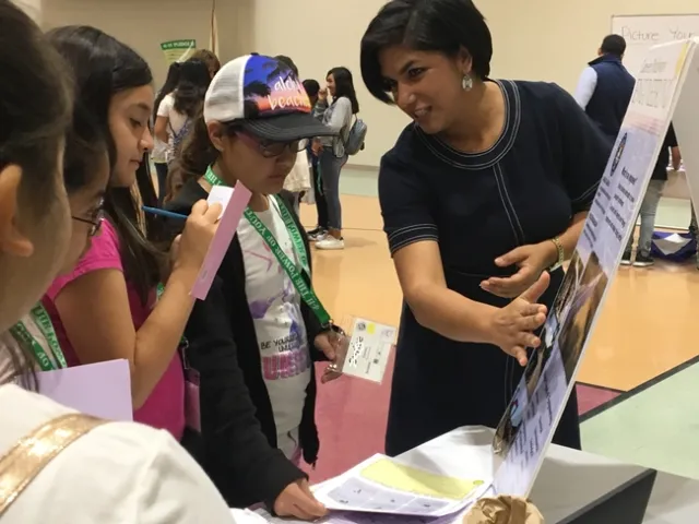 Woman teaching youth