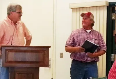 Dan Mulligan shares a work memory with Jeff Dahlberg and the crowd. Dan celebrated 31 years of service.