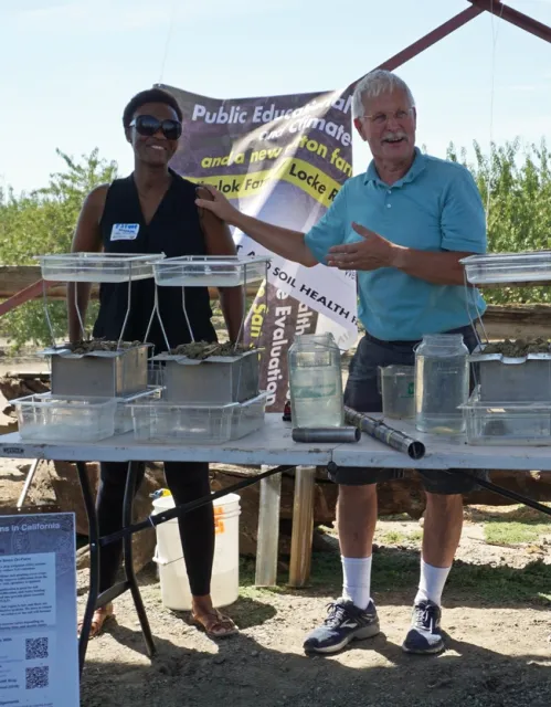 UCCE climate-smart educator Esther Mosase, left, and UCCE specialist Jeff Mitchell at the field day. Mosase is a native of Botswana, the African country where Mitchell served in the Peace Corps before she was born.