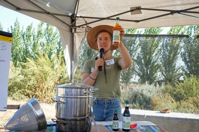 Farmer Katie Fyhrie showed equipment she uses for processing elderberries.
