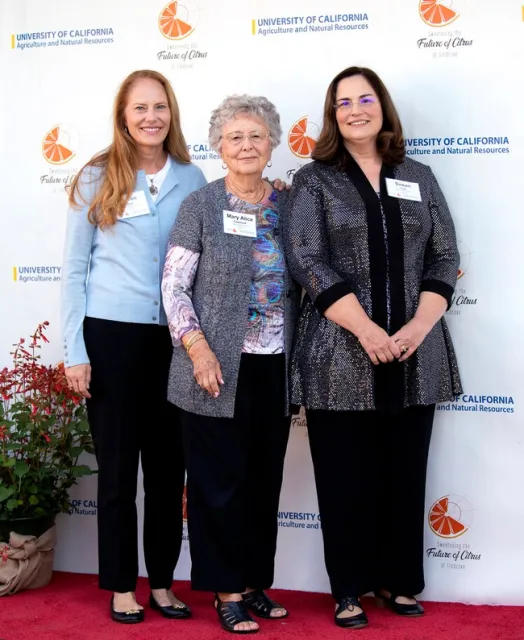 Susan Fritz and Karen Bray, shown with their mother, Mary Alice Copeland, spoke about their father's achievements and their memories of growing up living at Lindcove REC.