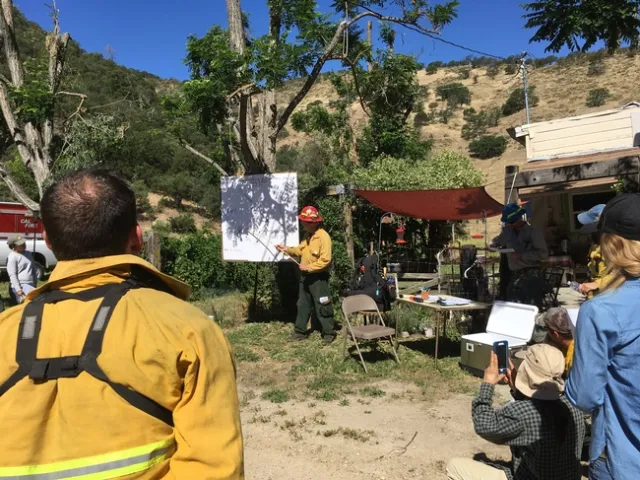 Burn Boss Phil Dye explains plan for the day.