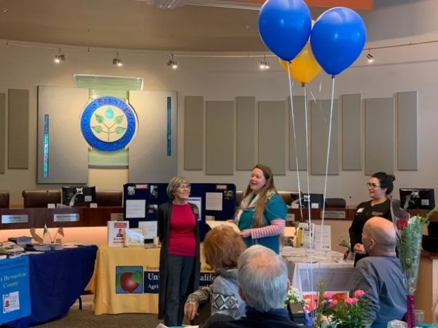 Loleta accepting certificate of appreciation