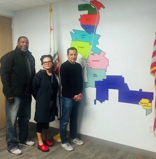 From left, Keith Nathaniel and Dohee Kim briefed Assembly Speaker Anthony Rendon on how LA County residents benefit from UCCE programs.
