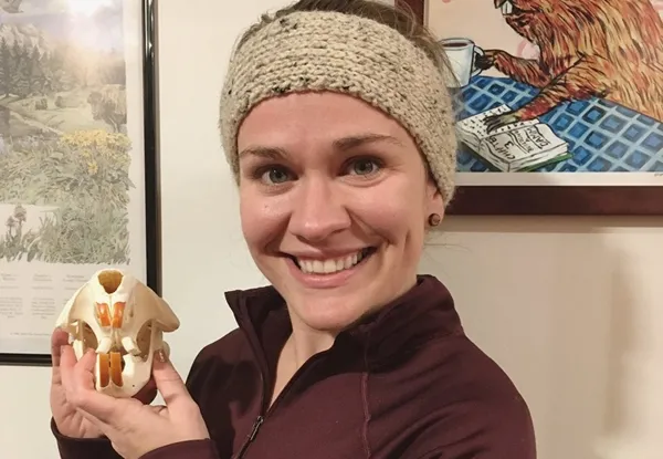 Fairfax holding a beaver skull. Photo by Andrew Peterson.