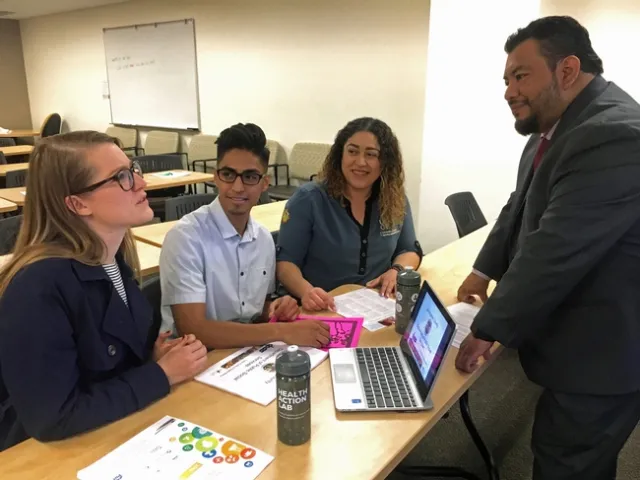Natalie Price and Stephanie Monterroza (former EFNEP supervisor) working with Food Security Coalition Community partners to increase CalFresh outreach.