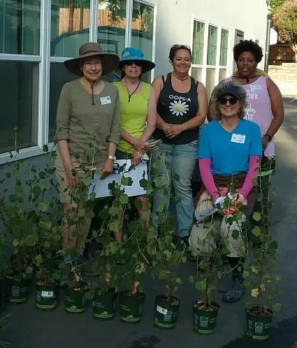 Betty (far left) volunteering at the native plant garden at Micah House with Master Gardener team leader volunteers (Sandi Szukalski, Victoria Bruce, Trisha Fitzgerald and Christy Gray).