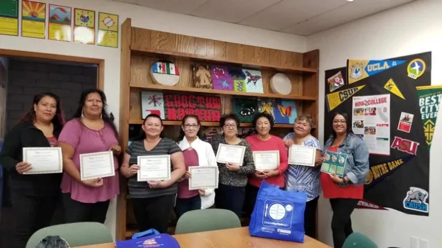 EFNEP Nutrition Educator Mariana Lopez (extreme right) Celebrating with her Graduate Participants