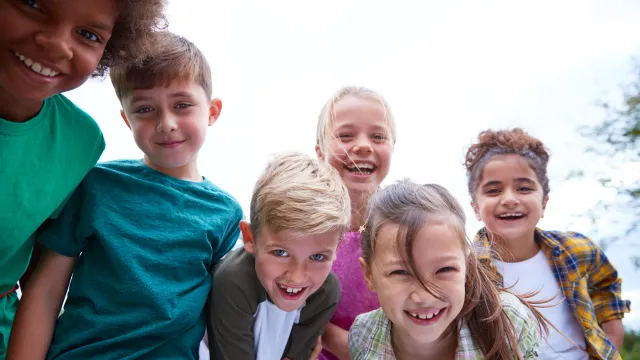 portrait-of-children-on-outdoor-activity-camping-t-372J5M4