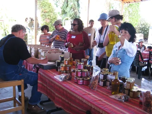 Farmer Al, Frog Hollow Farms, sells products to farm visitors