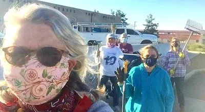 Debbie McAfee, Debi Dossey, Barbra Hamilton, Amanda Plunkett, and Meredith Hergenrader cleaning up weeds at the Phelan post office.