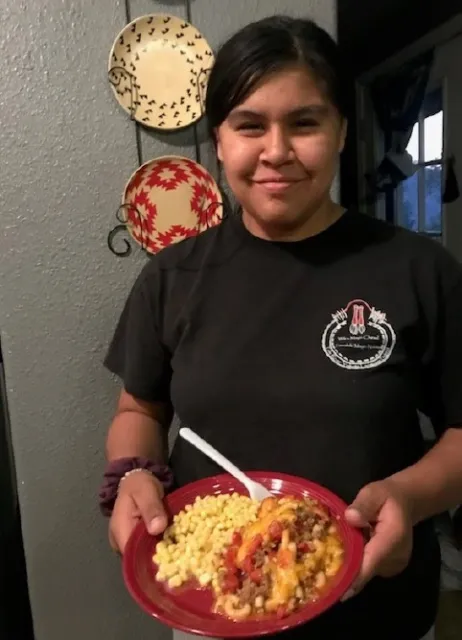 Youth with plate of food