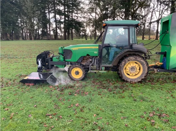 Figure 1. Electric weed control unit manufacturer by Zasso operating at Lewis Brown Research Center in Corvallis, OR. The electricity is applied through the metal probes. The electric resistance heats up the plant, producing steam.