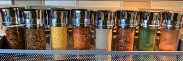 Dried fruit and vegetable powders in jars.