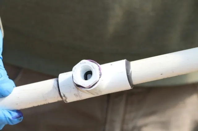 The “T” shown with the bushing and upper and lower shafts connected.