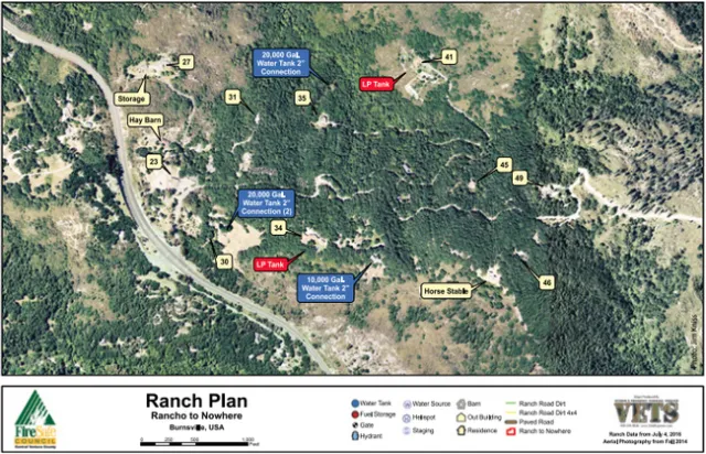 Google Earth aerial view of a ranch with roads, buildings and water tanks labeled.