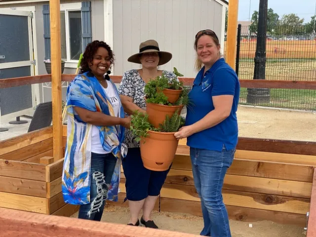 Elizabeth McSwain, UCCE San Bernardino Master Food Preserver Program Coordinator Dee Denton, and UCCE San Bernardino Master Gardener Program Coordinator Maggie O'Neill
